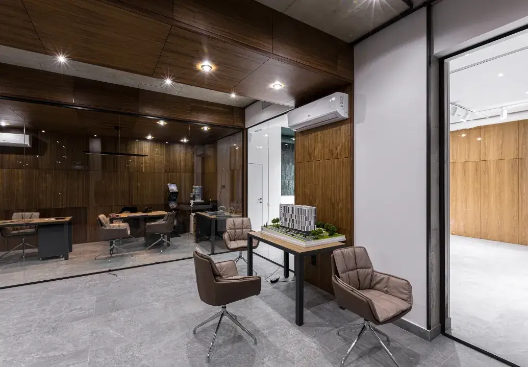 Professional office space freshly cleaned and organized, with modern furnishings and spotless glass walls