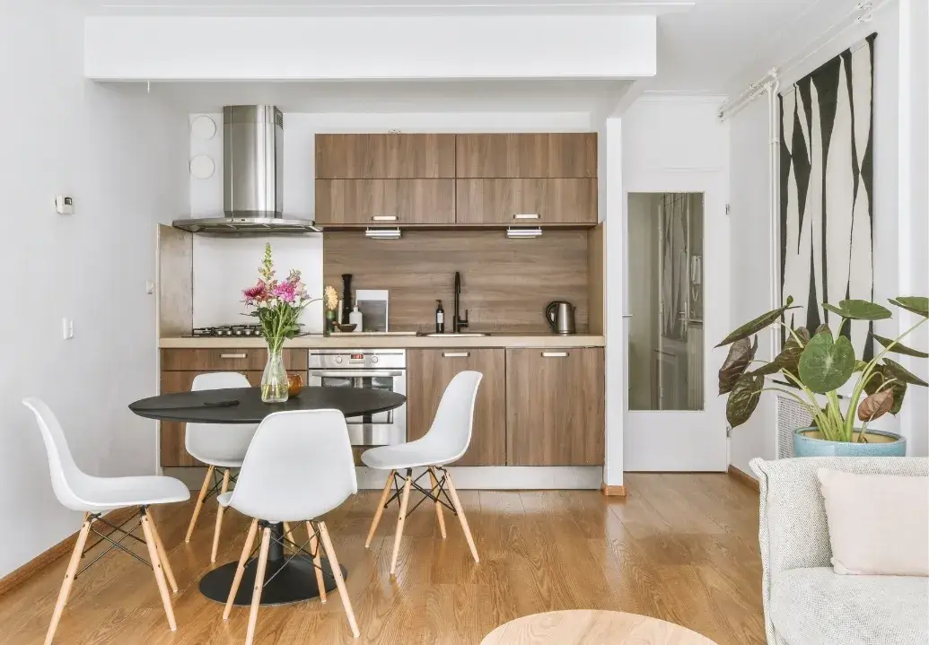 Bright and cozy kitchen and dining space with a fresh and clean feel after a regular cleaning session